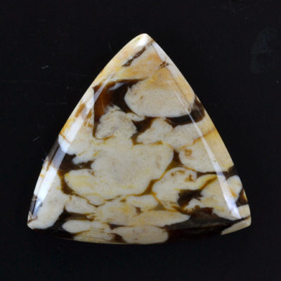 A triangle shaped piece of jade.
