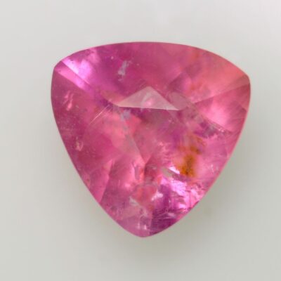 A pink sapphire with a pear shape.