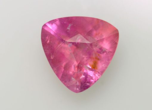 A pink sapphire with a pear shape.
