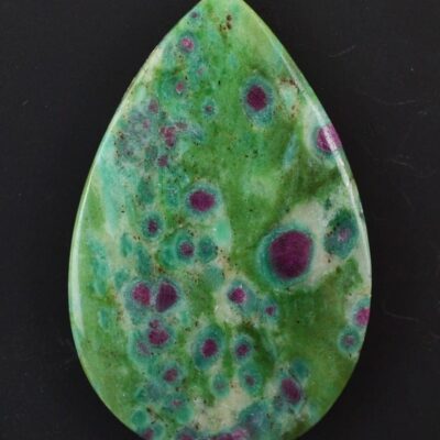 A green and purple stone tear shaped pendant.