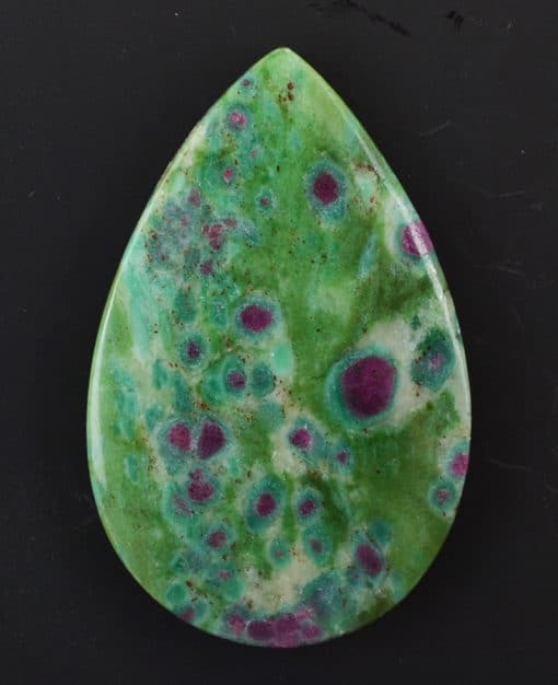 A green and purple stone tear shaped pendant.