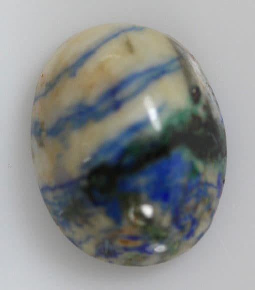 A blue and white Azurite 2.05cts Oval Cabochon 8.80 x 7.00mm Q0038 shaped stone.