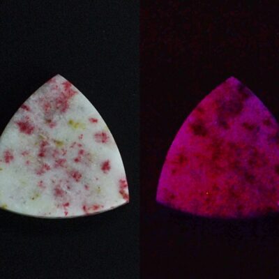 Two pink and white triangles on a black background.