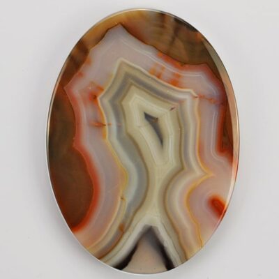 An oval agate plate with a white background.