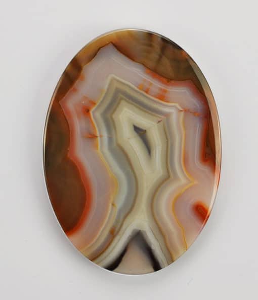 An oval agate plate with a white background.