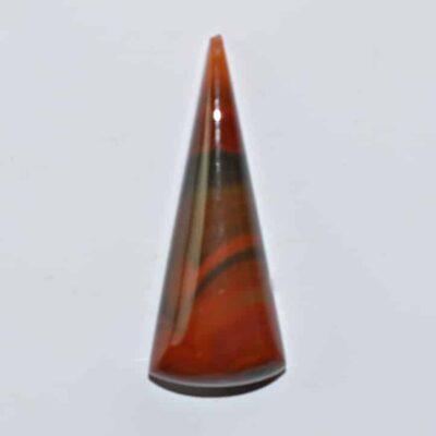 A cone shaped piece of orange agate.