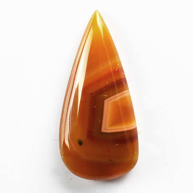An orange agate tear shaped pendant.