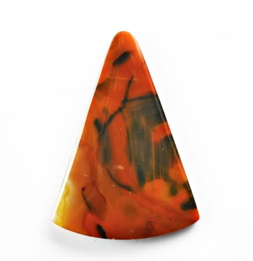 A triangle shaped piece of orange and black agate.