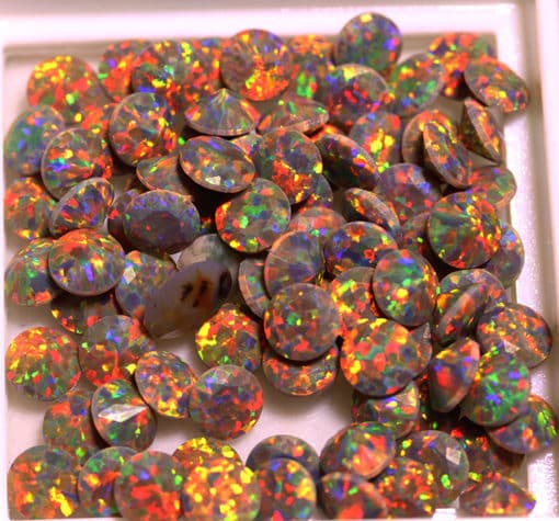 synthetic polymer black opals 42.31 cts