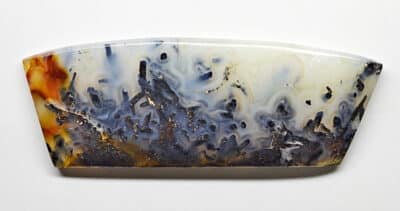 A piece of agate on a white surface.