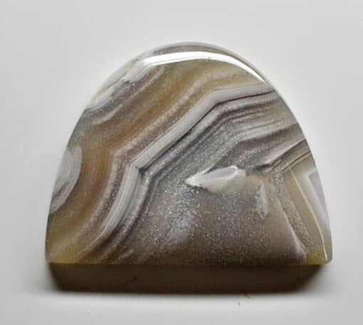 A piece of agate on a white surface.