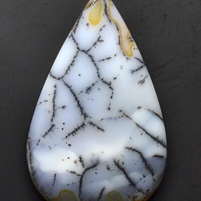 A white and yellow agate tear shaped pendant.