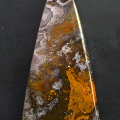 A triangular shaped piece of agate.