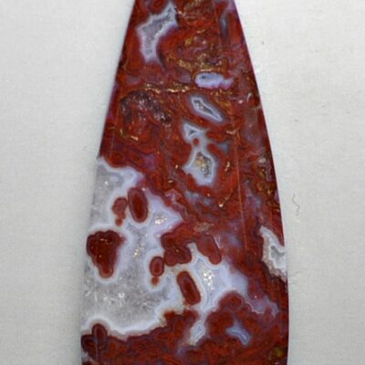 A red and white agate tear shaped pendant.