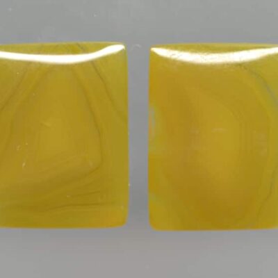 A pair of yellow agate cabochons.