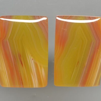 A pair of yellow and orange agate earrings.