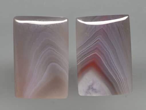 A pair of agate cabochons.