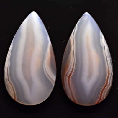 A pair of agate tear shaped cabochons.