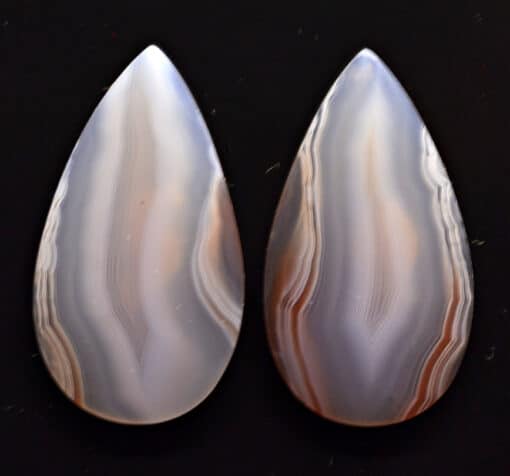 A pair of agate tear shaped cabochons.