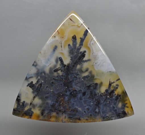 A triangle shaped piece of agate.