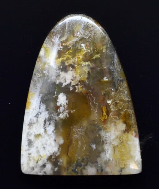 A piece of agate with a yellow and white pattern.
