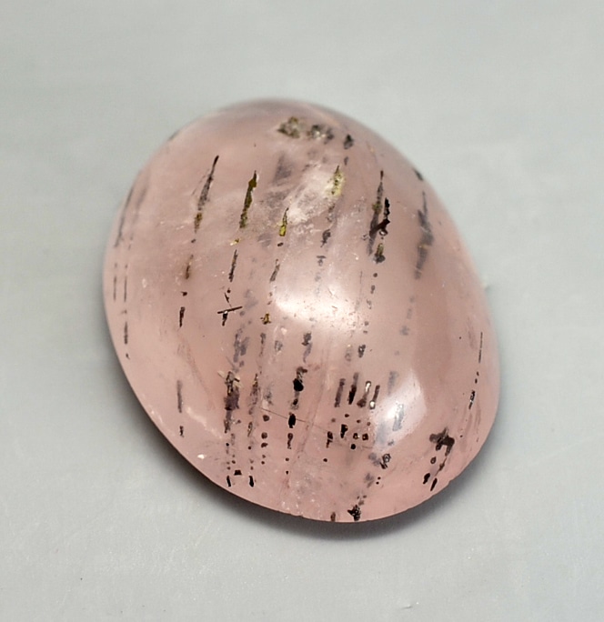 Rose Quartz with Bismuthinite  23.76 ct  Oval Cabochon 22.90 x 16.00 mm  y91176
