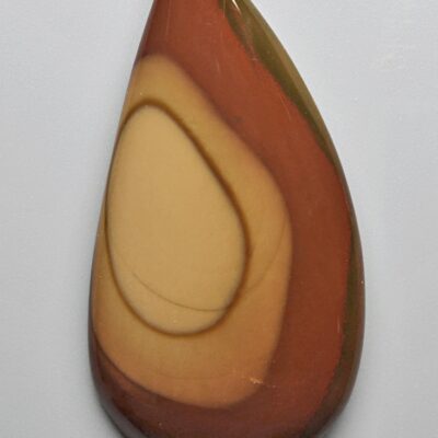 A piece of agate with a brown and yellow color.