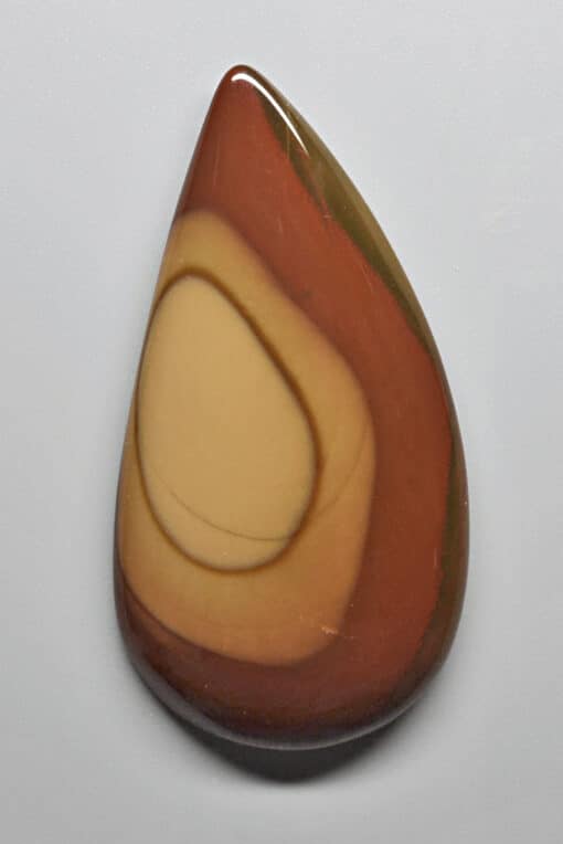 A piece of agate with a brown and yellow color.