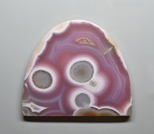 A pink and purple agate on a white background.