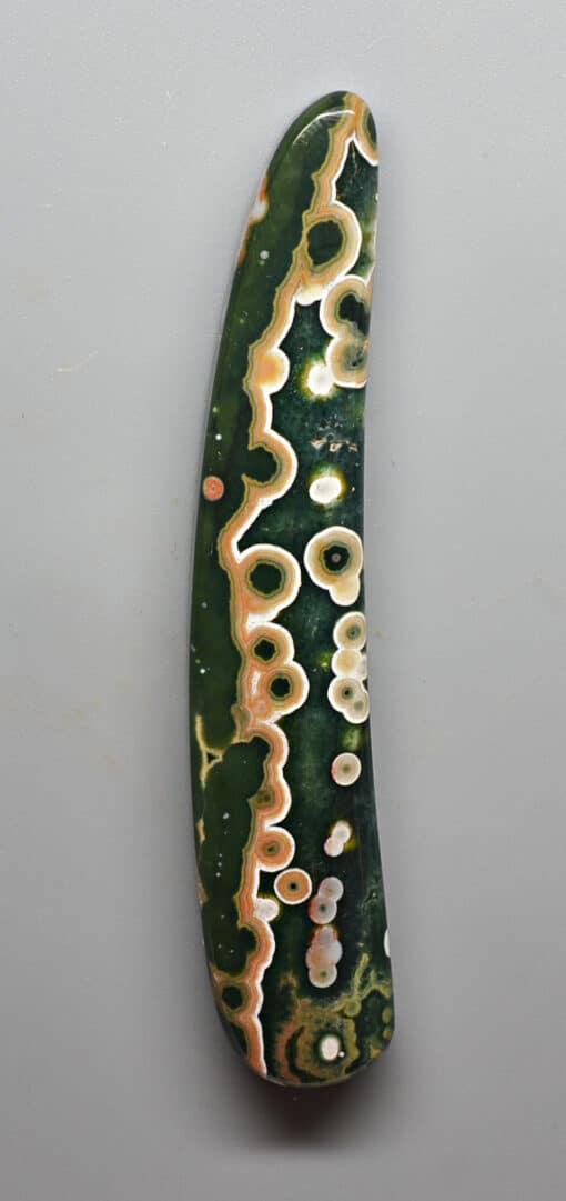 A green and white piece of agate.