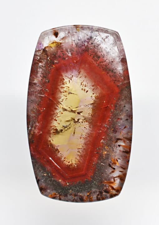 A piece of agate with a red and yellow color.