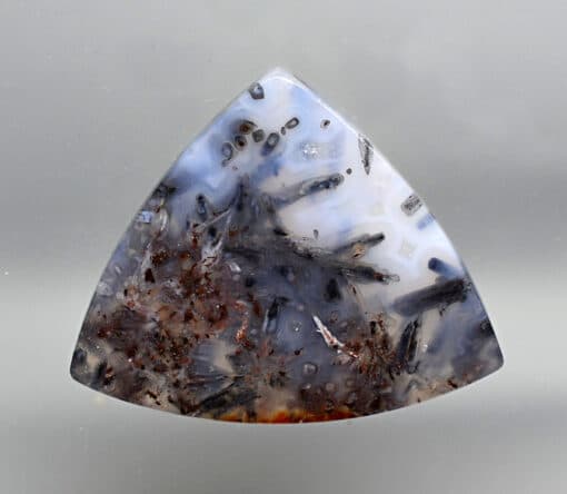 A triangle shaped piece of agate.