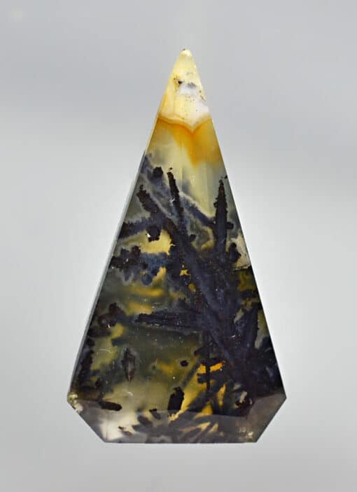 A triangle shaped piece of agate.