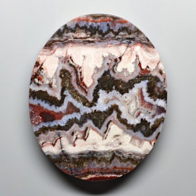 A round piece of agate on a white background.