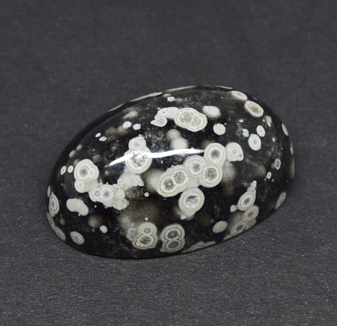 Cosmic Obsidian 36.16 ct Oval Cabochon 27.00x 12.00 x 12.00 y100829