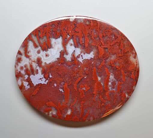 A red and white oval object.