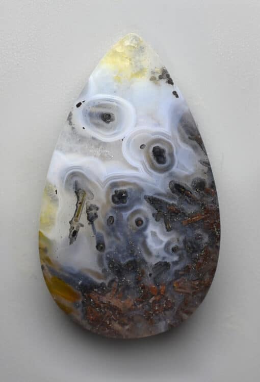 A tear shaped piece of agate.