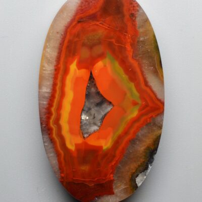 An orange and yellow agate on a white background.