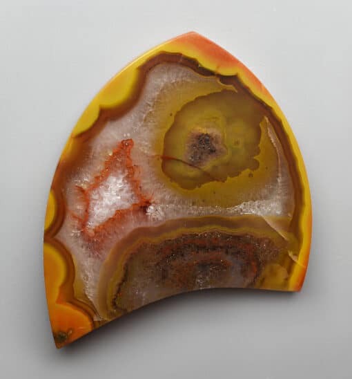 A piece of agate on a white surface.