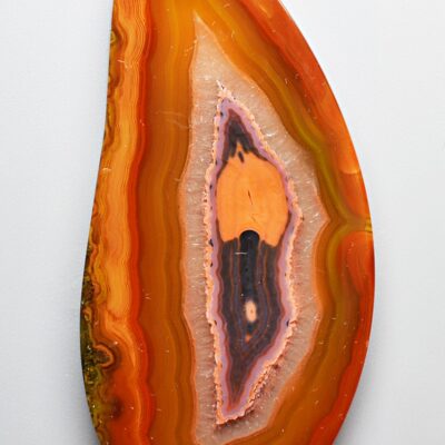 A piece of agate on a white surface.