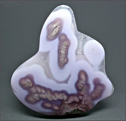 A close-up of a purple and white rock.