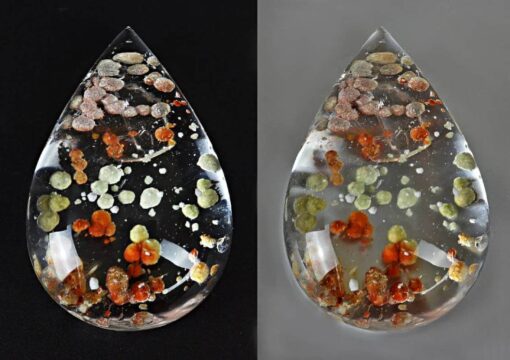 A Quartz with Cookeite 85.53 ct Drop Shape Cabochon 39.50 x 26.60 x13.30mm Brazil z333 shaped piece of glass with orange and yellow flowers on it.