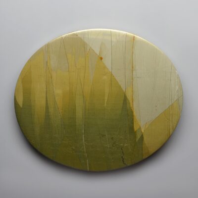 A yellow and green circular painting on a white background.