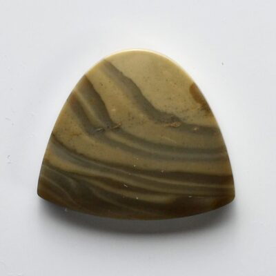A triangle shaped piece of brown agate.