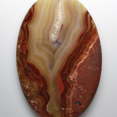 An oval agate on a white background.