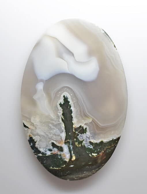 A white and brown agate on a white background.