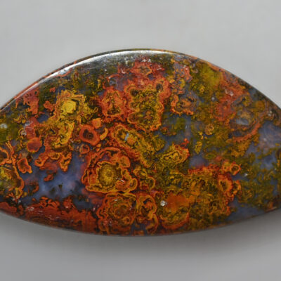 A piece of red, orange and yellow lava stone.