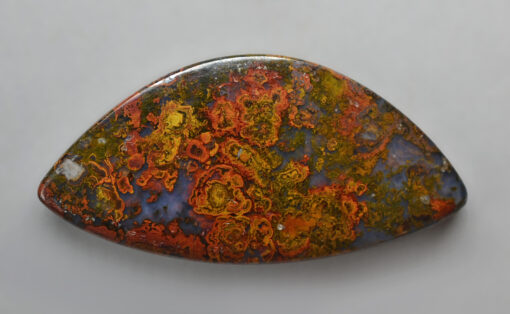 A piece of red, orange and yellow lava stone.