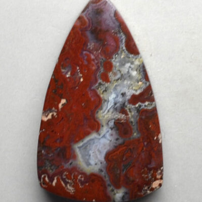 A red and white agate pendant.