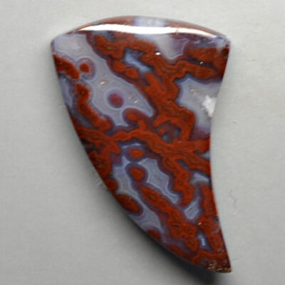 A red and blue agate pendant.